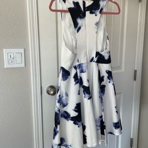 White dress with blue floral pattern. Size medium. Lulu’s. Worn once